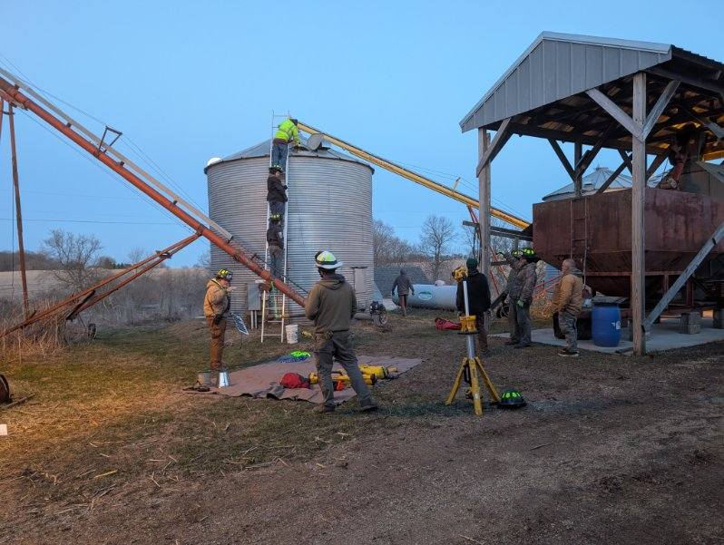 Lund Fire volunteers preparing for grain bin rescue scenarios during hands‑on training.